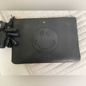 Leather clutch bag by Anya Hindmarch